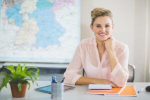 Teacher sitting in classroom